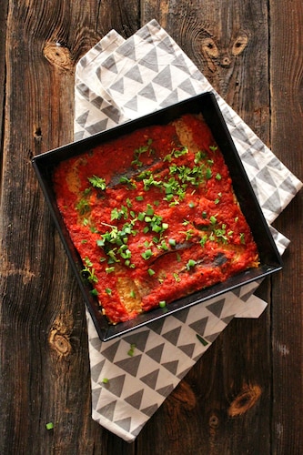 Przepis na Dorsz pieczony z ryżem pod pomidorową kołderką Dorsz pieczony z ryżem pod pomidorową kołderką